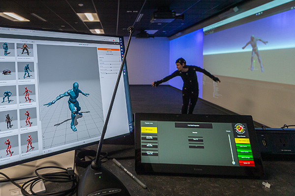 A student in a motion capture studio.